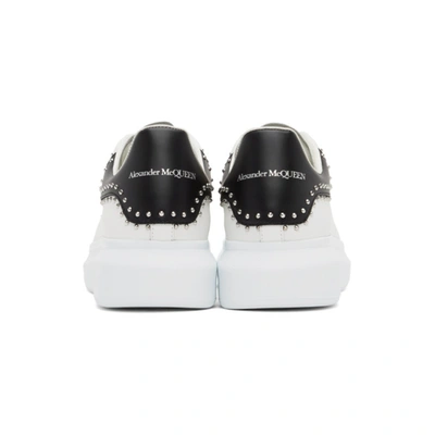 Shop Alexander Mcqueen White & Black Studded Oversized Sneakers In 9089 Whtbks