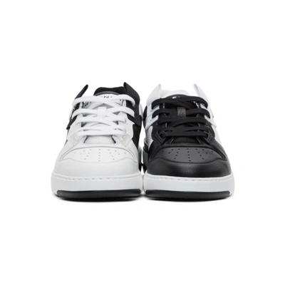 Shop Givenchy White & Black Asymmetric Wing Low Sneakers In 116-white/b