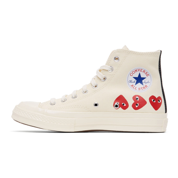 white chucks with red heart
