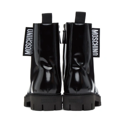 Shop Moschino Black Logo Tab Combat Boots In 000