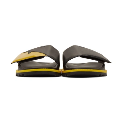 Shop Fendi Black And Yellow Bag Bugs Sandals In F036b - Bla