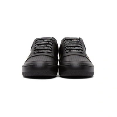 Shop Versace Black Floral Ilus Sneakers In D41m Black