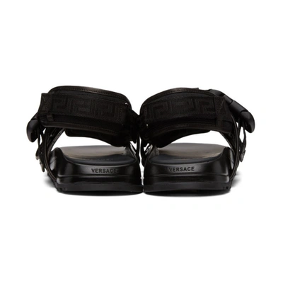 Shop Versace Black Greca Straps Sandals In D41e Black