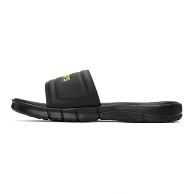 Shop Vetements Black Reebok Edition Logo Slides In Black / Yellow 14620