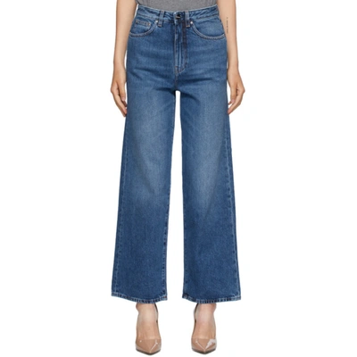 Shop Totême Blue Flair Jeans In 405 Washed