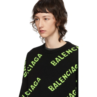 Shop Balenciaga Black And Green All Over Logo Sweater In 9113 Blk/gn