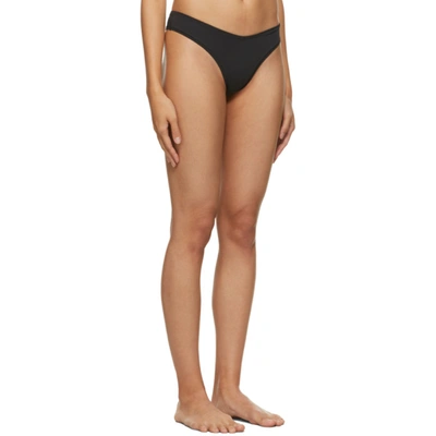 Shop Skims Black Cotton Dipped Thong In Soot