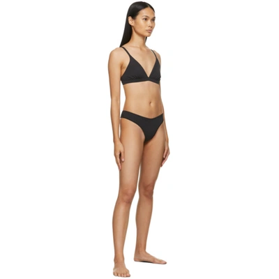Shop Skims Black Cotton Dipped Thong In Soot