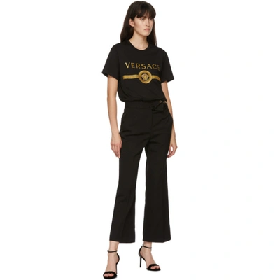 Shop Versace Black Wool Flare Trousers In A1008 Nero