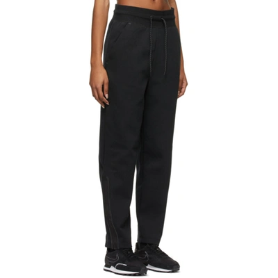 Shop Nike Black Fleece Tech Sportswear Lounge Pants In 010 Black