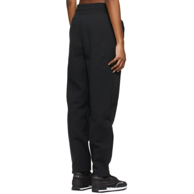Shop Nike Black Fleece Tech Sportswear Lounge Pants In 010 Black