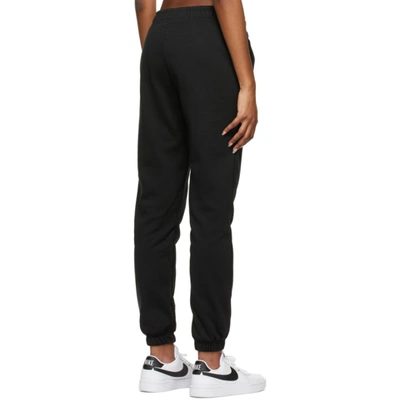 Shop Nike Black Sportswear Swoosh Lounge Pants In 011 Black