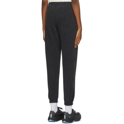 Shop Erl Black Daisy Lounge Pants In 3 Facedblk
