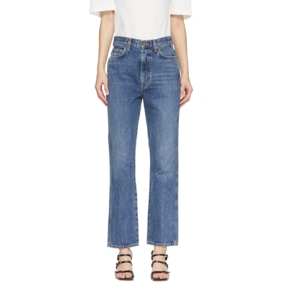 Shop Agolde Blue Pinch Waist High Rise Kick Jeans In Placebo