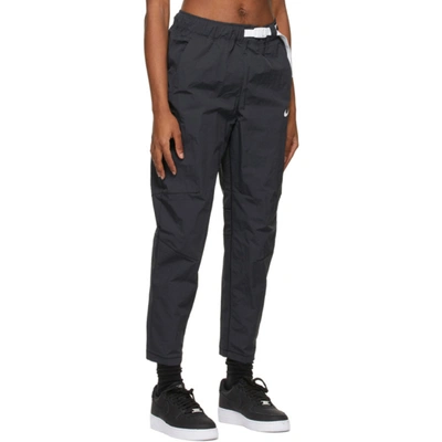 Shop Nike Black Sportswear Tech Pack Woven Lounge Pants In 010 Black