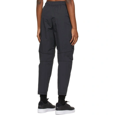 Shop Nike Black Sportswear Tech Pack Woven Lounge Pants In 010 Black