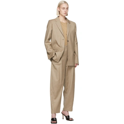 Shop Totême Beige Wool Flannel Trousers In 817 Beige