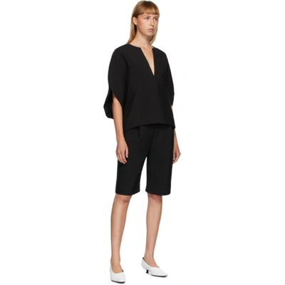 Shop Totême Black Lluc Shorts In 200 Black