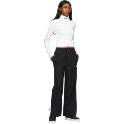 Shop Nike Black Icon Clash Sportswear Track Pants In 010 Black