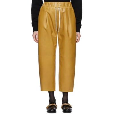 Shop Givenchy Yellow Leather Drawstring Trousers In 715 Mustard