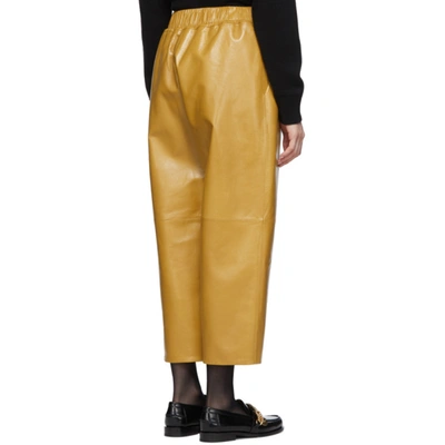 Shop Givenchy Yellow Leather Drawstring Trousers In 715 Mustard