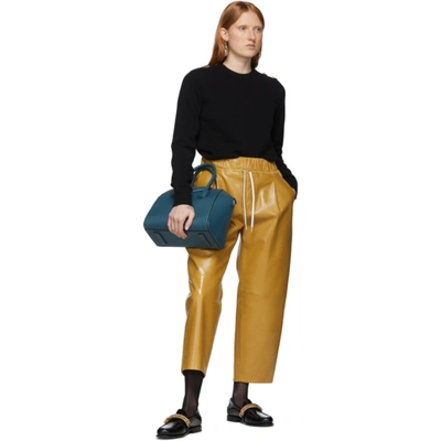 Shop Givenchy Yellow Leather Drawstring Trousers In 715 Mustard