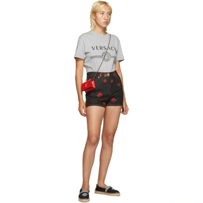 Shop Versace Black Denim Rose Shorts In A8008 Black