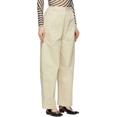 Shop Henrik Vibskov Beige Tanoi Trousers In 102/502 San