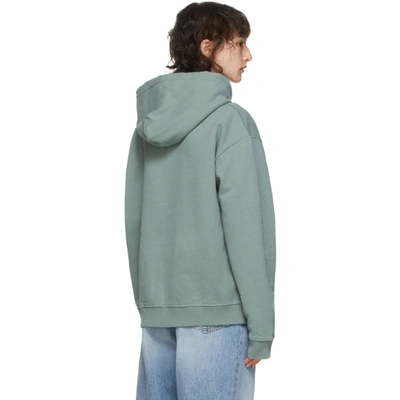 Shop Acne Studios Green Logo Print Hoodie In Dusty Green