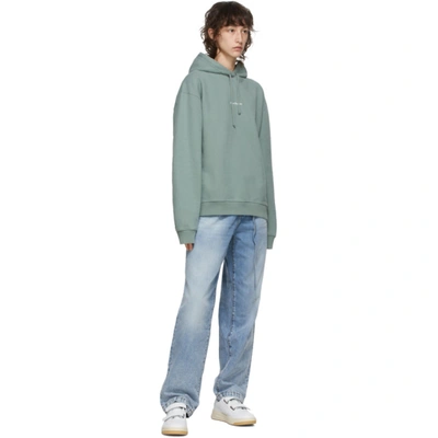 Shop Acne Studios Green Logo Print Hoodie In Dusty Green