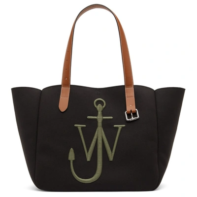 Leather-trimmed embroidered canvas tote