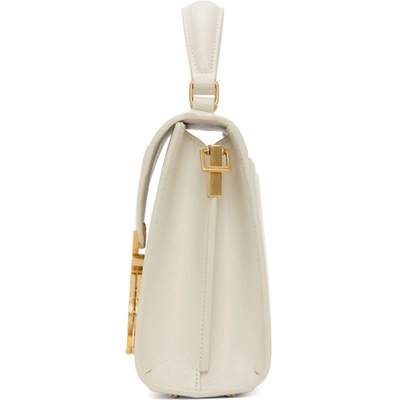 Shop Saint Laurent Off-white Mini Cassandra Bag In 9207 White