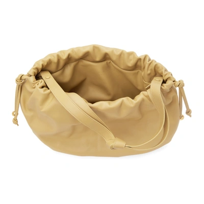 Shop Bottega Veneta Beige ‘the Pouch' Clutch In 9403 Tapioca