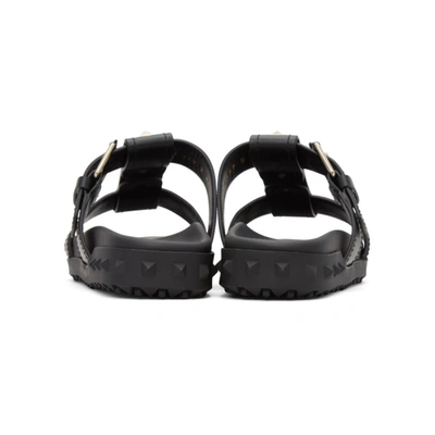 Shop Valentino Black  Garavani Rockstud Sandals In 0no Black