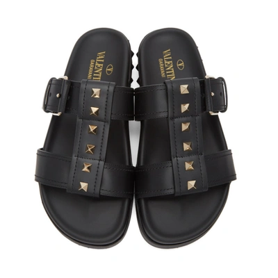Shop Valentino Black  Garavani Rockstud Sandals In 0no Black