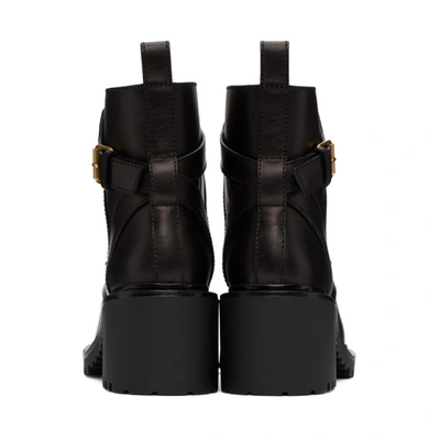 Shop Valentino Black  Garavani Vlogo Combat Boots In 0no Black