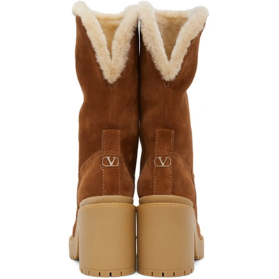 Shop Valentino Tan  Garavani Shearling Boots