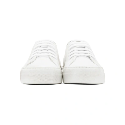 Shop Common Projects White Tournament Low Super Sneakers In 0506 White