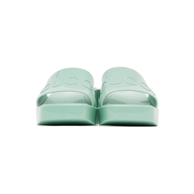 Shop Gucci Green Rubber Slide Sandals In 3926 Green