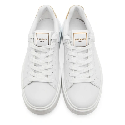 Shop Balmain White & Gold B-court Sneakers In Gad Wh/gold
