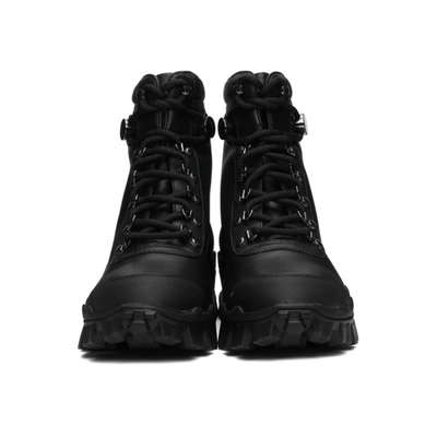 Shop Moncler Black Leather Helis Boots In 999 Black