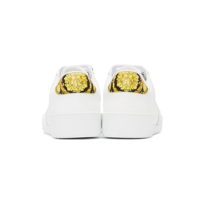 Shop Versace White Ilus Sneakers In Dbn9 White