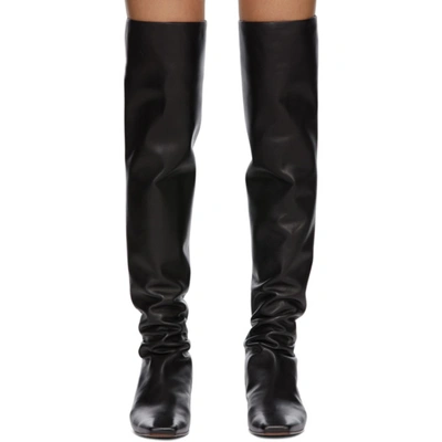 Shop The Row Black Slouch Flat Tall Boots In Blk Black