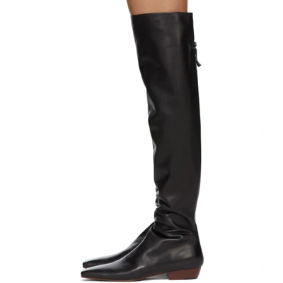 Shop The Row Black Slouch Flat Tall Boots In Blk Black
