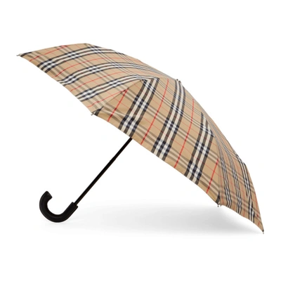 Shop Burberry Beige Vintage Check Folding Umbrella In Archv Beige
