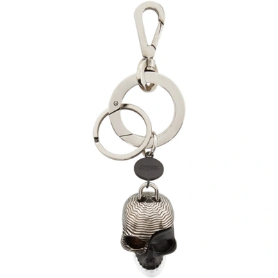 Shop Alexander Mcqueen Silver Divided Skull Keychain In 1078 Bkwht