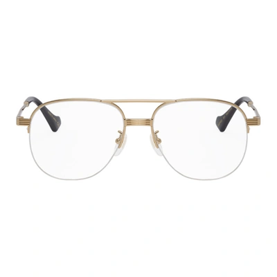 Shop Gucci Gold Aviator Glasses In 001 Gold