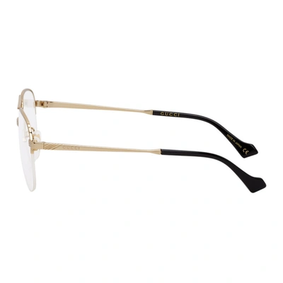 Shop Gucci Gold Aviator Glasses In 001 Gold