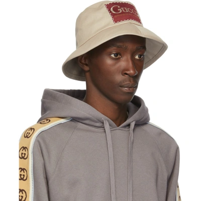 Shop Gucci Beige Label Bucket Hat In 1400 Lead