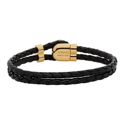 Shop Versace Black And Gold Leather Medusa Bracelet In : D41o Blkg